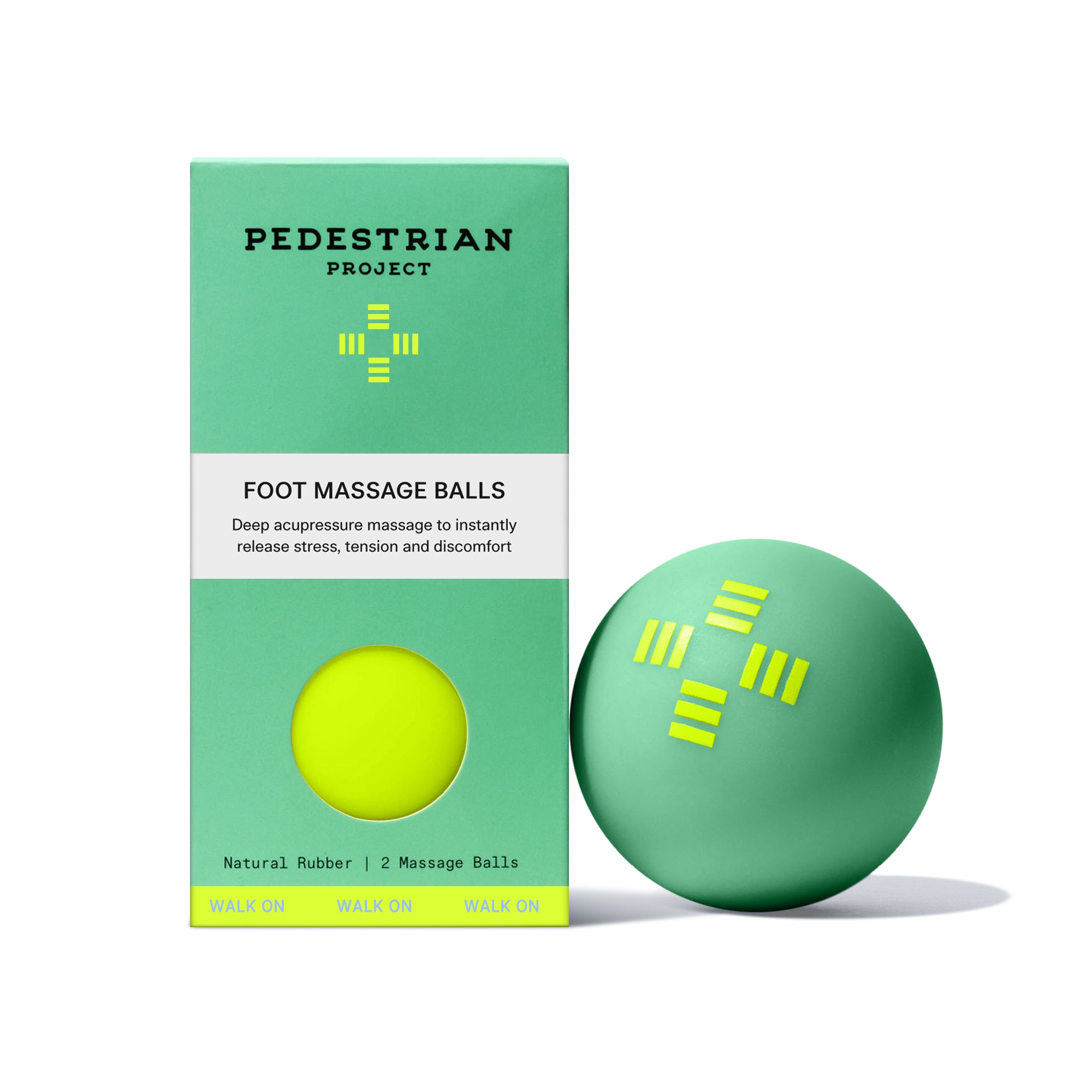 Pedestrian Project Foot Massage Ball carton alongside a green acupressure massage ball with a neon crosswalk logo